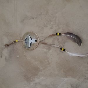 Steer Leather/Feather Art